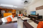 Living area with cable TV, comfortable sofas and ample seating